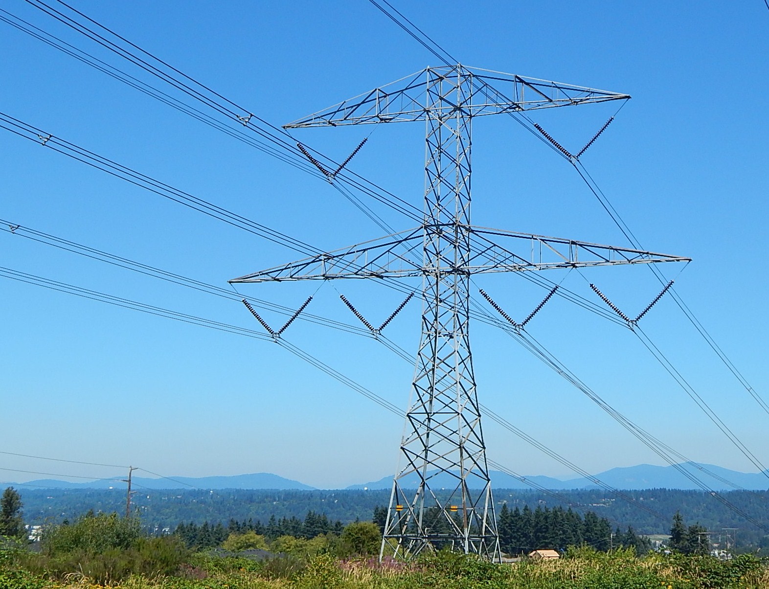 High-voltage transmission towers and lines.
